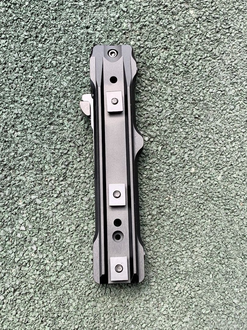 Prindere Henneberger pentru Merkel weaver la sina Leica